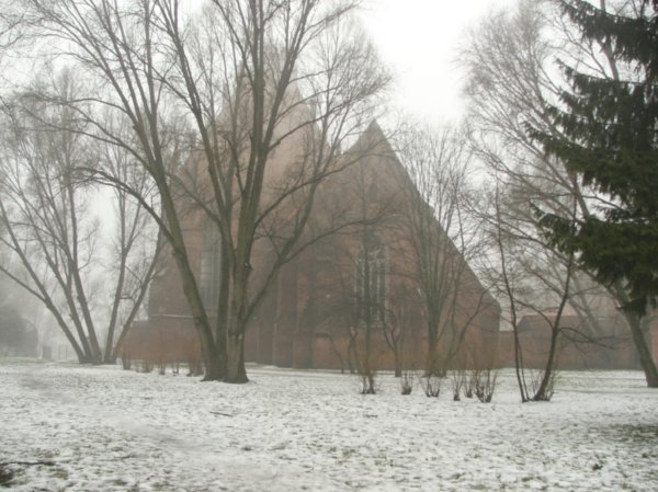 a cute church under the snow