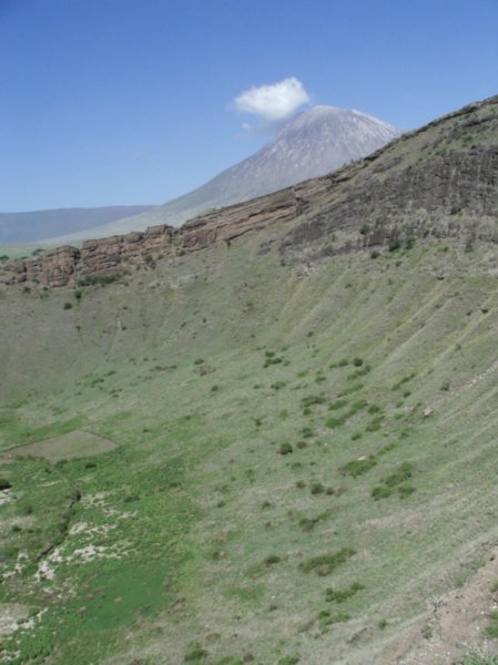 a crater and the Oldonyo Lenghai further away