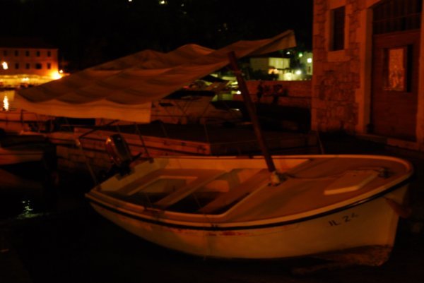 wooden boat by night