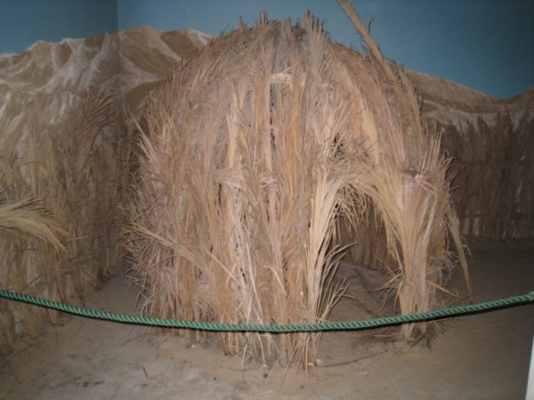 Tripoli museum - a hut from palm leaves in the oasis