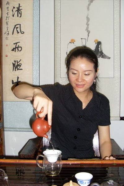 Linda pouring tea