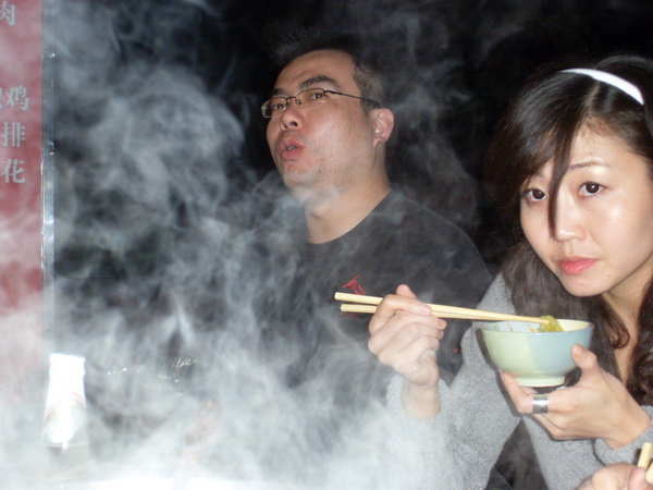 Eating hotpot outdoors with friends