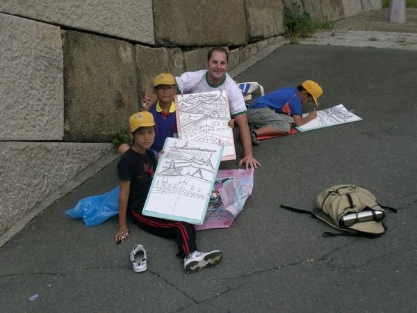 Children sketching the castle
