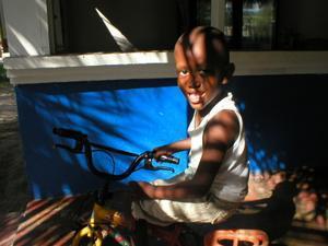 Garifuna boy on bicycle