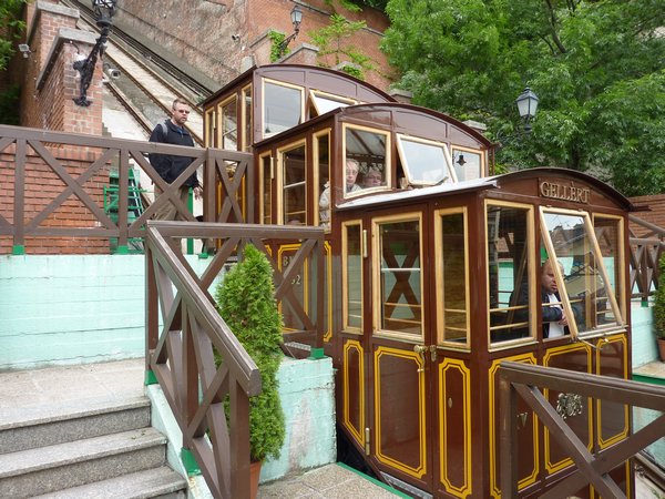 Ev boards the funicular to Buda Castle