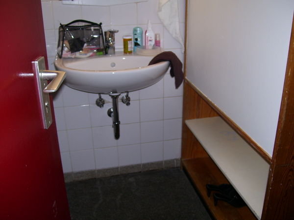 My sink with shelves on the lower right