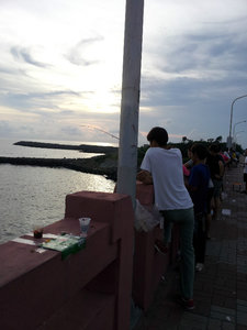 Fishing at a Tainan bridge