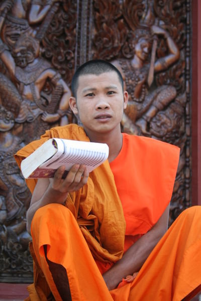 Novice Monk outside temple