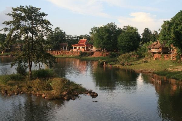 The river and temple at Tad Lo in the evening