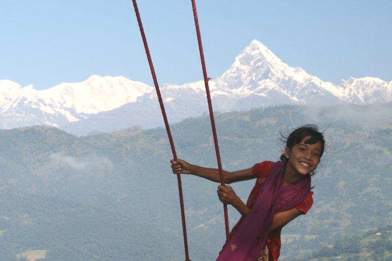 Girl on a Dashain swing