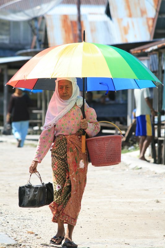 Muslim lady with umbrella