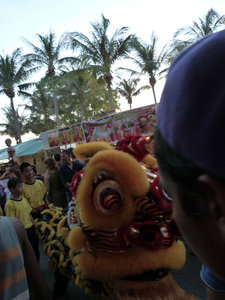 Celebrating the opening of the markets with a dragon dance