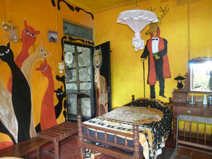A bedroom at Helga's Hotel