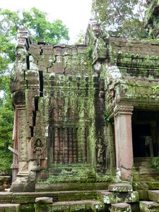 At Ta Prohm.  One good earthquake and it would be gone...miracle it's still there!
