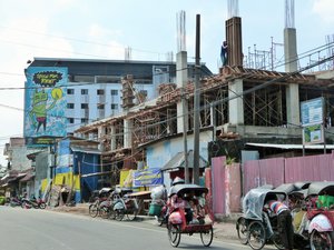 Views from a becak - construction underway