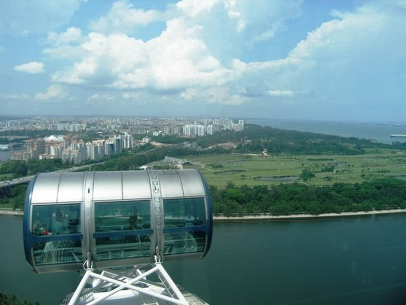 i - Singapore skyline and a golf course