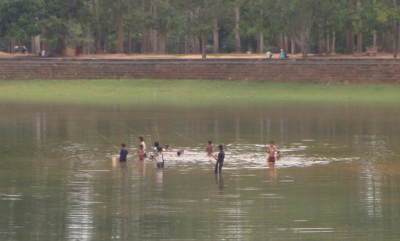 Kids fishing at Angkor Wat