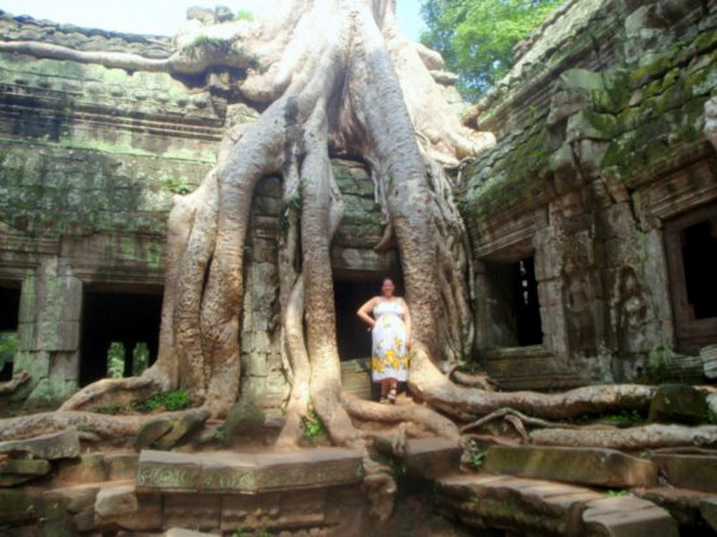 Me with the jungle roots at Angkor Thom