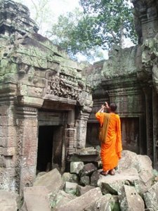 Monk taking pics at Angkor Thom
