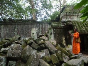 Monk with the moss at Angkor Thom