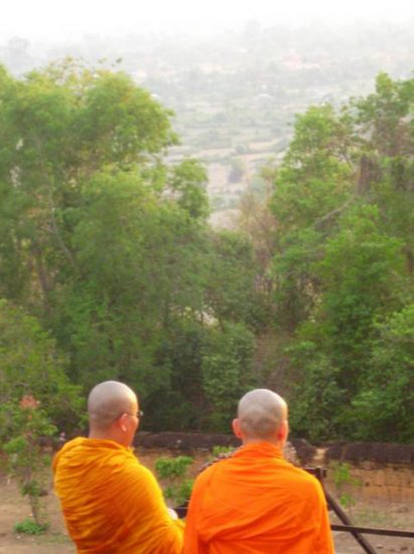Monks at Phnom Bakheng at sunset