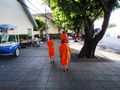 Monks on the sidewalk in Bangkok