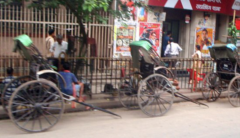 Hand pulled rickshaws on the road