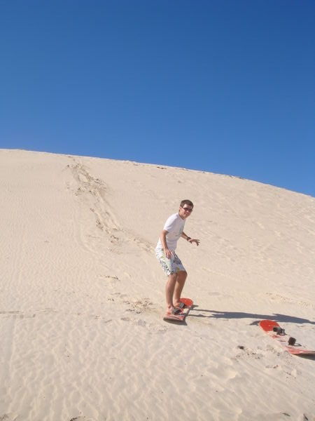 Me attempting to sand surf