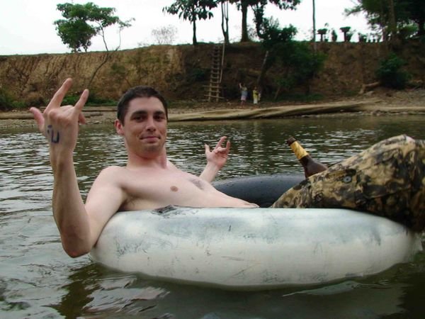 Darren tubing down the river