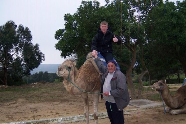 Mike rides a camel!