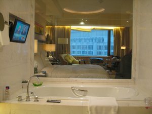Window from bath into hotel room