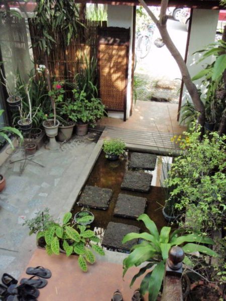 One of the gardens in Sam's "100 year old Teak House in Chaing Mai"