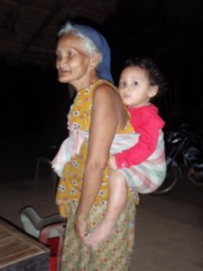 Grandma spent all day, and most of the night carrying this toddler on her back