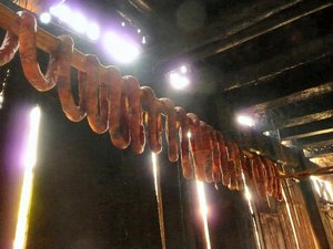 sausage hanging to smoke & dry