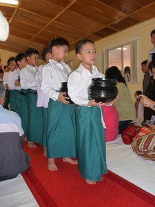 novices in traditional Burmese "Longyi"