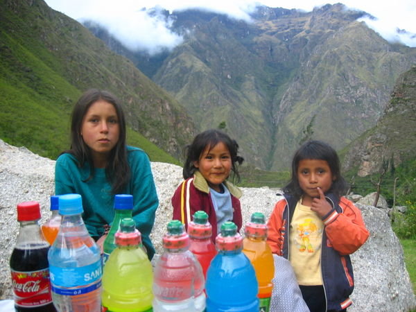 sweet quechua girls at our first camp in a tiny mountain village. they set up a beverage stand for the 3 of us and offered great company