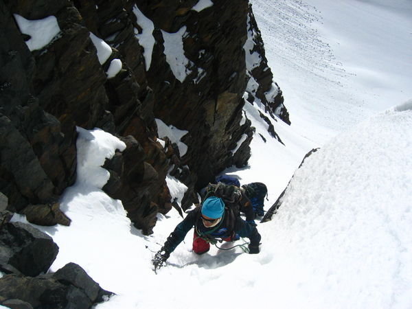 topping out the steepest section of the gully to gain the summit ridge