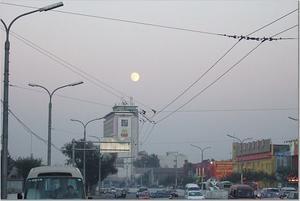 Giant moon over central Beijing