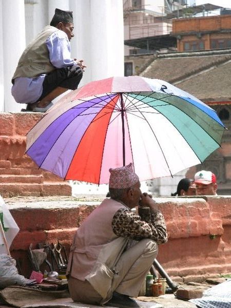 A Nepali Man Watching a Political Rally