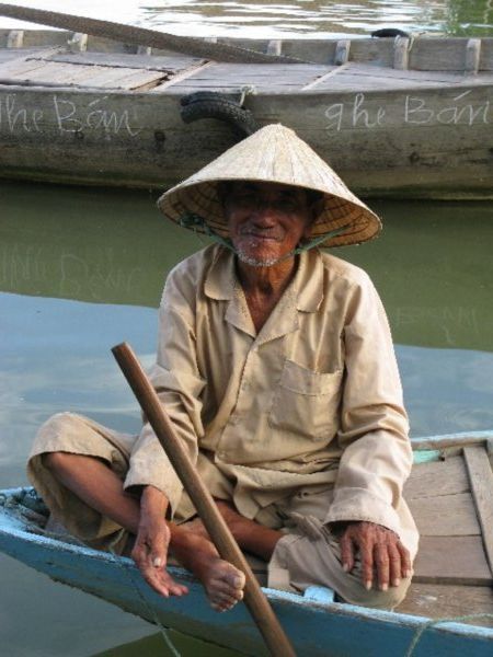 Old Man Selling Stuff from his Boat