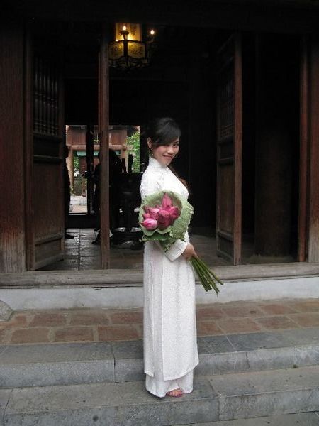 A Vietnamese Model Having Her Picture Taken in the Temple of Literature