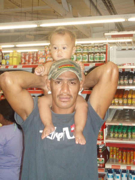 Papa and Baby  at a Market