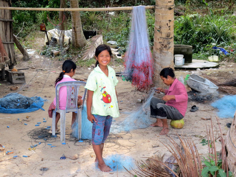 THIS FAMILY WORKS ALL DAY MENDING NETS