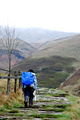 Lav starts the steep ascent up Jacob's Ladder. Edale Valley, Derbyshire 