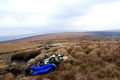 Steve gets horizontal in the peaty grass after 4 hours of hiking. Kinder Downfall, Derbyshire