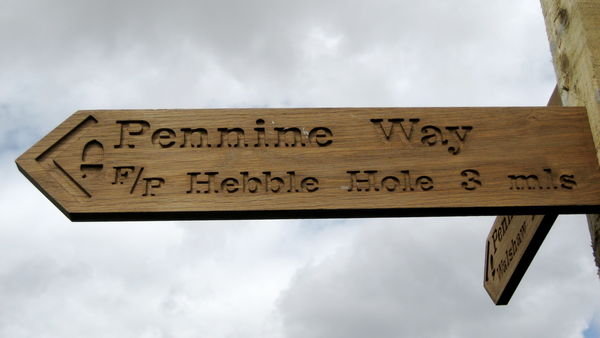 Signpost to amusingly named Hebble Hole. Pennine Way, Yorkshire