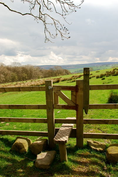 Stile with views across the Yorkshire countryside. Pennine Way