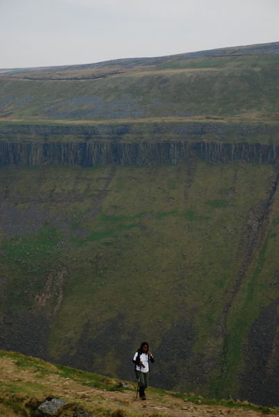 With Lavinia for scale, you can try to visualise the immense depth of the High Cup Nick Valley. Pennine Way, Cumbria