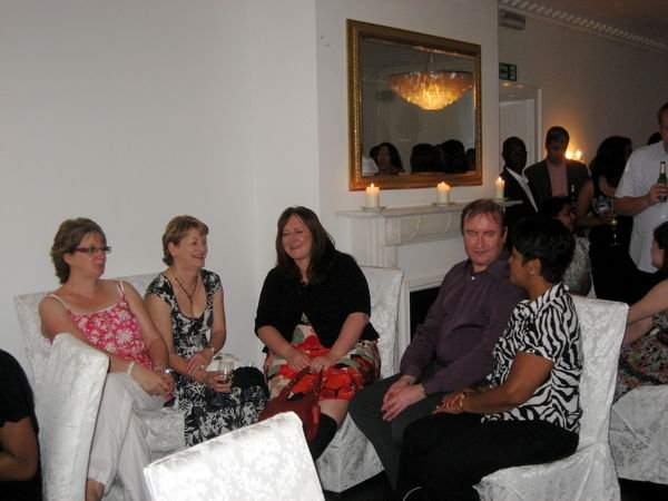 Guests in the White Room. In the background can be seen the three candles lit in memory of the baby we lost, and  in memory of all of the babies lost due to ectopic pregnancy and pregnancy loss.