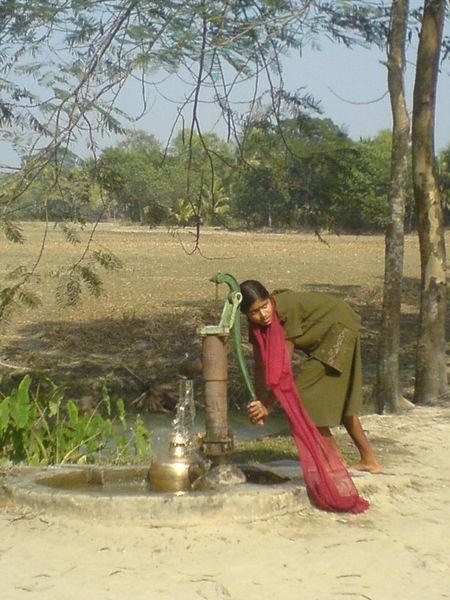 Village girl at tap